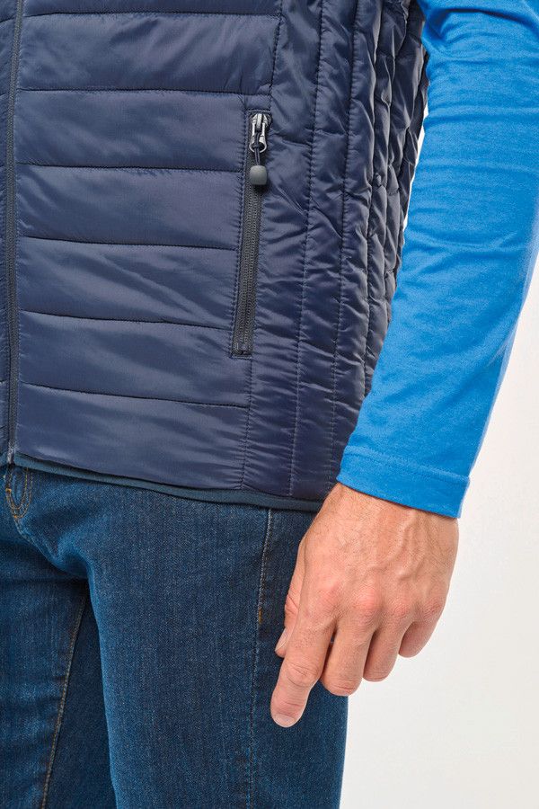 Détail poches zippées doudoune sans manche. Couleur marine - Marque Kariban