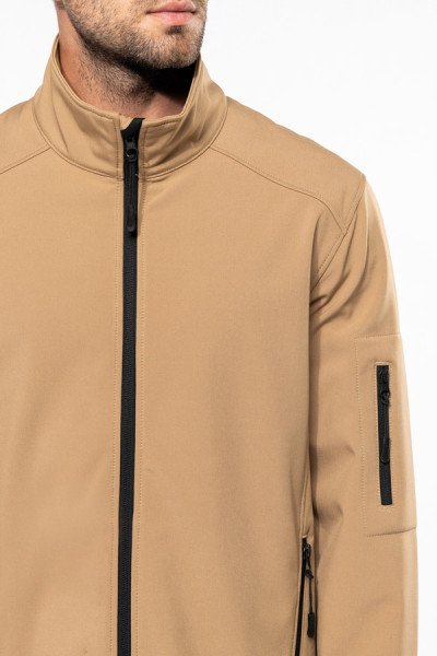 Détail fermeture softshell homme personnalisable couleur camel. Détail fermeture softshell homme personnalisable couleur camel.