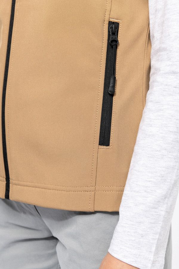 Détail bodywarmer femme softshell poche latérale zippée.
